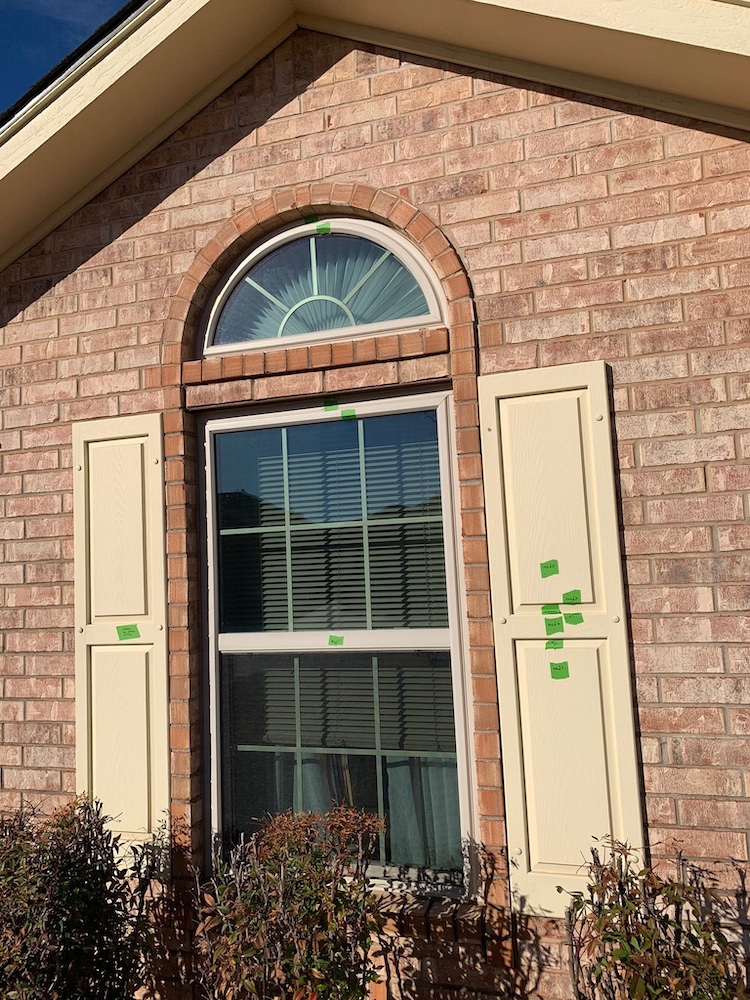 Before — Weathered exterior window trim and shutters on a Newcastle, OK home